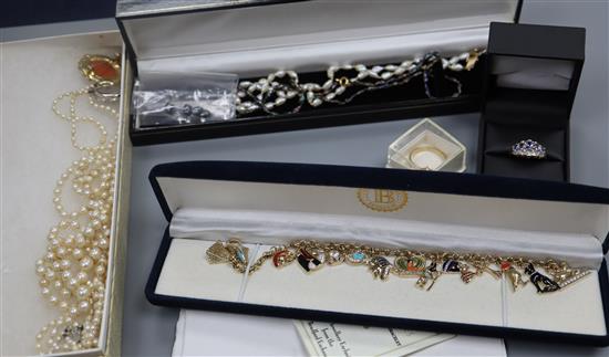 A group of assorted mainly costume jewellery including cultured pearl necklace, rings and pendants including tanzanite and bracelet